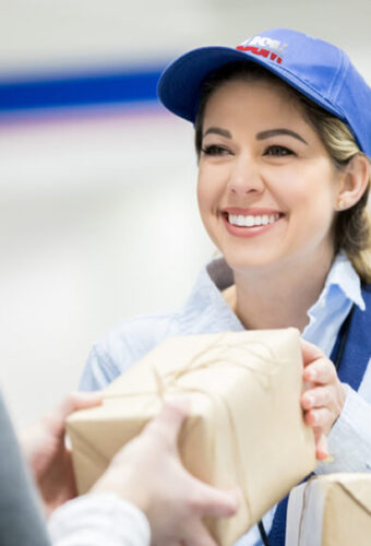 Postal worker handing over a parcel
